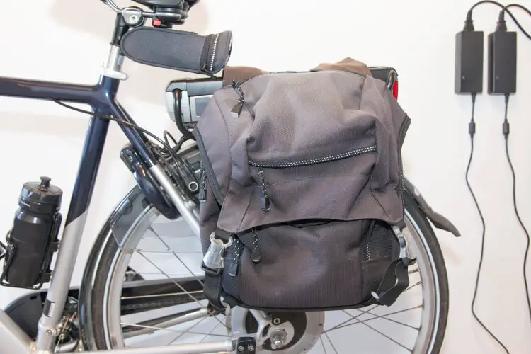 charging electric bicycle with courier bags