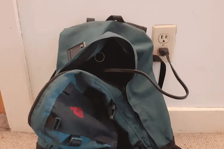 charging electric bike battery in backpack